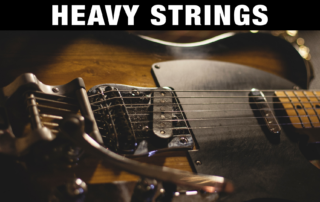 Heavy vs Thin Strings